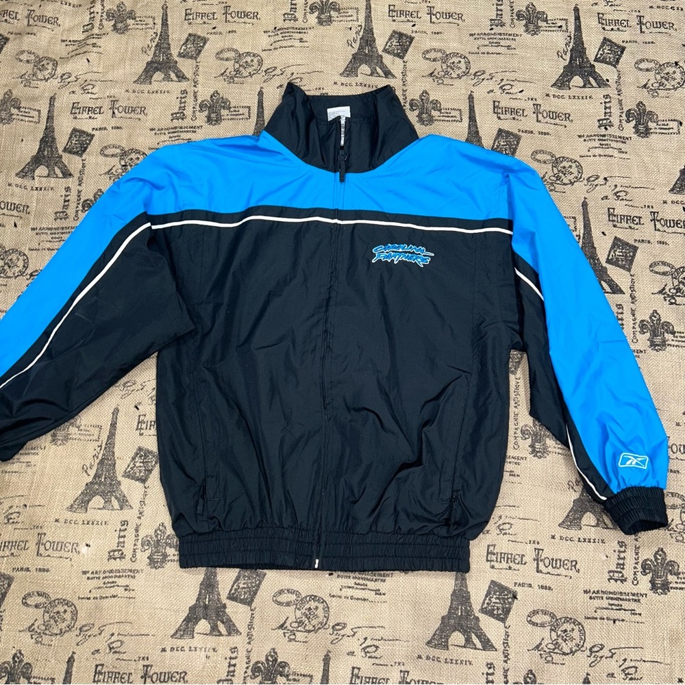 Reebok Nfl Panters Kids Vintage Black Blue Jacket Size 14-16
Excellent Condition